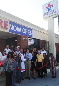 Advanced Urgent Care opened with a ribbon cutting, assisted by Mayor Bill Bogaard.