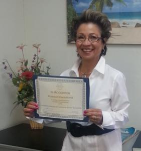 Gloria Lopez of ProTravel International was recognized for 25 years of Chamber membership.