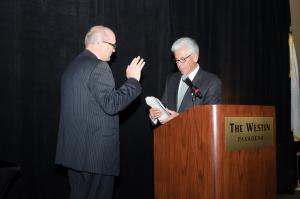 Chamber Board Chair Ben Green is sworn in by Master of Ceremonies Chamber Board member George Falardeau.