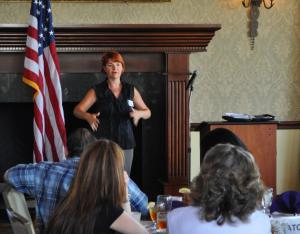 Marianne Emma Jeff of Women's Business Momentum Center sponsored September's Luncheon Alliance.