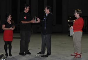 Chamber Board Chair CL Keedy presents the Cocktail of the Year 2013 award to Alan Lau of Toro Sushi.
